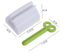 Load image into Gallery viewer, Rolling Tube Toothpaste Squeezer Dispenser